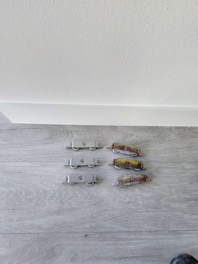 sliding glass door roller replacement cost - old worn rollers vs new rollers